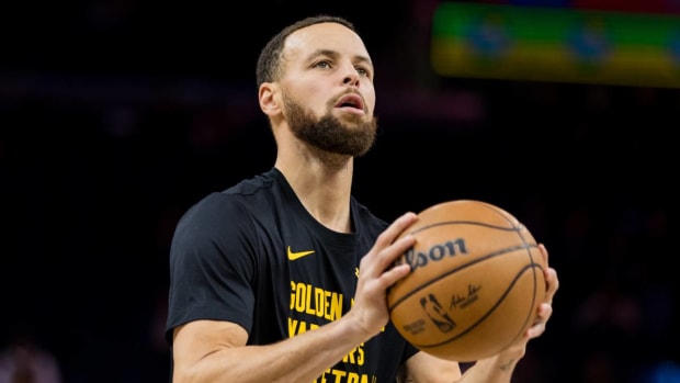 Stephen Curry warms up before a game against the Clippers.